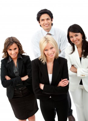 group of business people smiling isolated over a white background